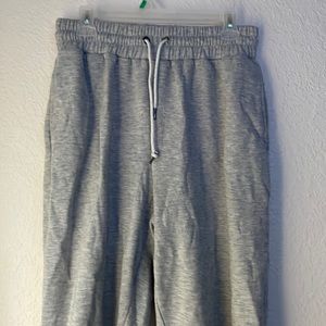 Lightly worn grey sweatpants